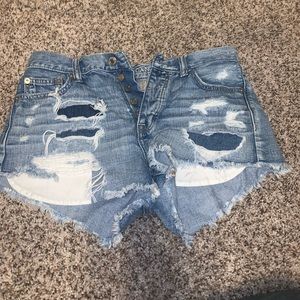 american eagle light/dark blue ripped jean shorts